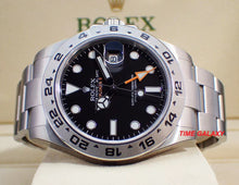 Load image into Gallery viewer, Rolex 216570-0002 features black dial with arrow shaped 24 hour hand and hour markers in Chromalight