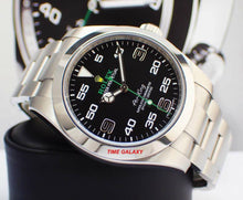 Load image into Gallery viewer, Rolex 116900-0001 features black dial, Arabic numerals indexes