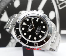 Load image into Gallery viewer, Rolex 114060-0002 features black dial, gloss finish, stick dot indexes, Mercedes hands